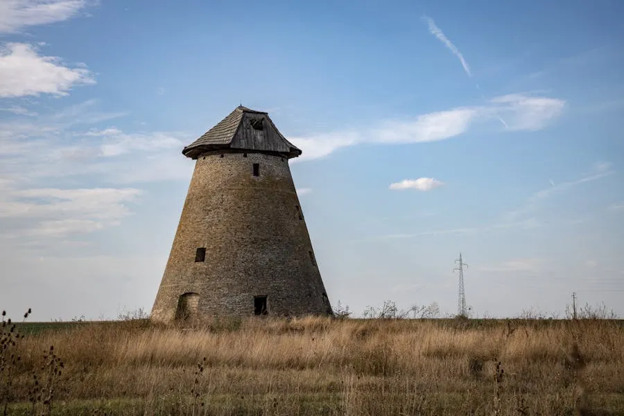 Historic stone windmill in a rural Caribbean landscape
