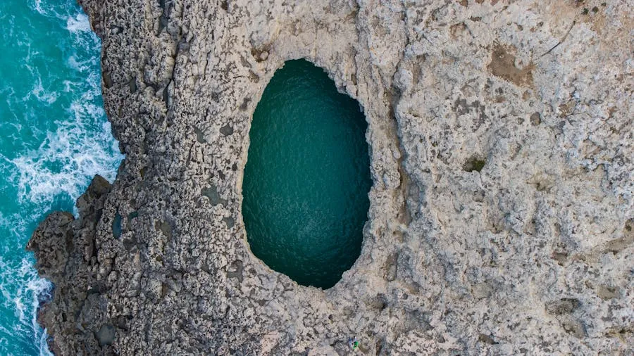 Natural rock pool inside a sea cave