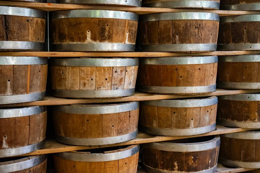 Rows of rum ageing barrels in a distillery