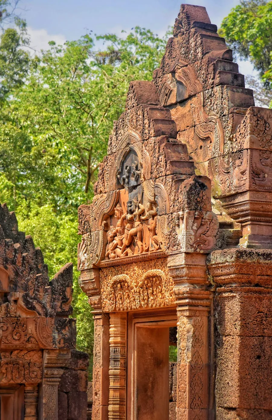 Intricate pink sandstone carvings at Banteay Srei temple