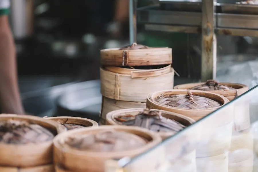 Bamboo steamer baskets filled with dim sum dumplings