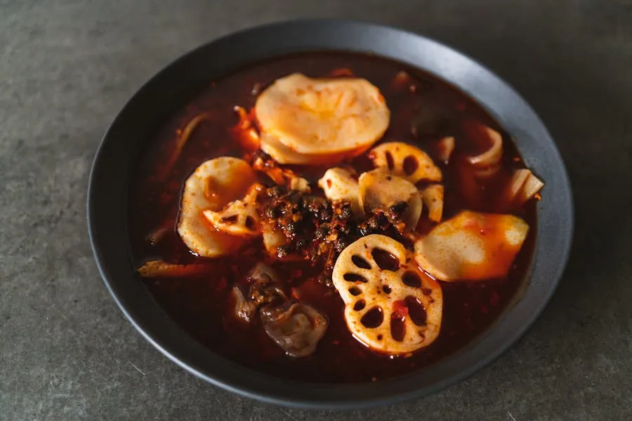 Sichuan hotpot with bubbling red chili oil and various ingredients