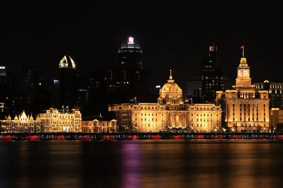 The Bund waterfront in Shanghai at night with Pudong skyline across the river