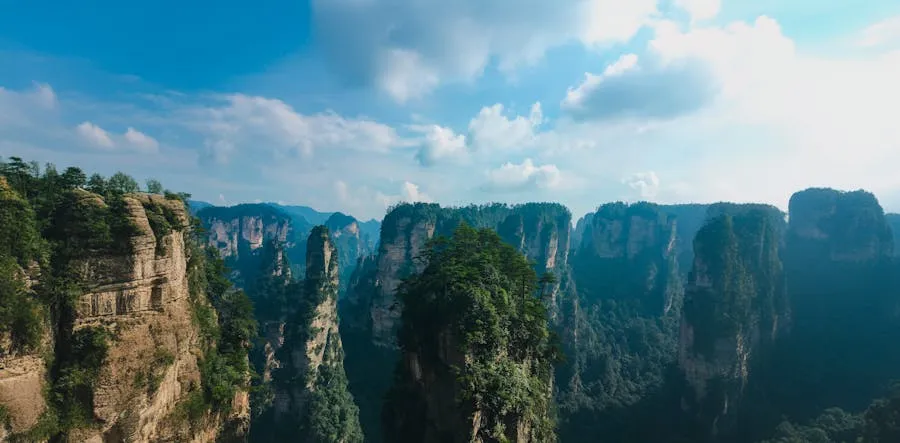 Sandstone pillar peaks of Zhangjiajie emerging from morning mist