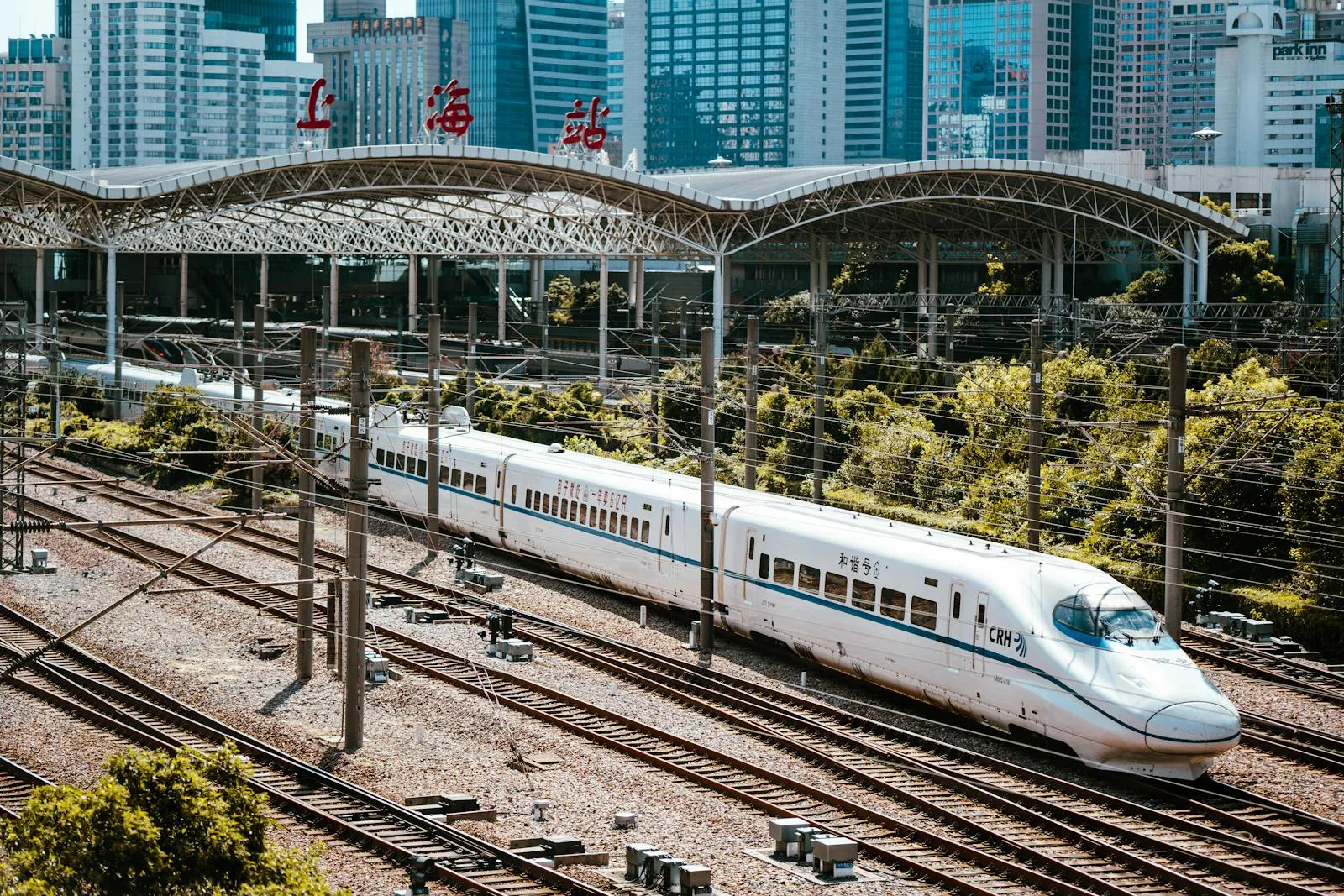 Chinese bullet train at a modern high-speed railway station