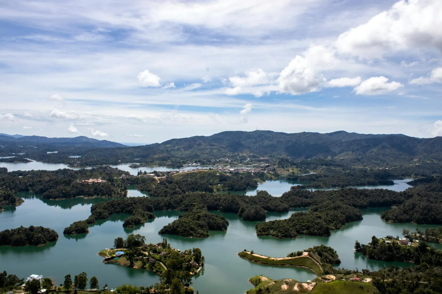 A breathtaking aerial shot of Guatapé Reservoir showcasing its intricate network of islands and lush landscape.