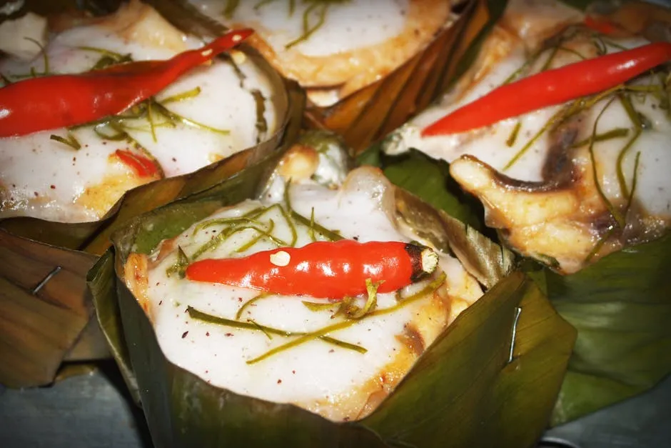 Fish wrapped in banana leaves for liboke