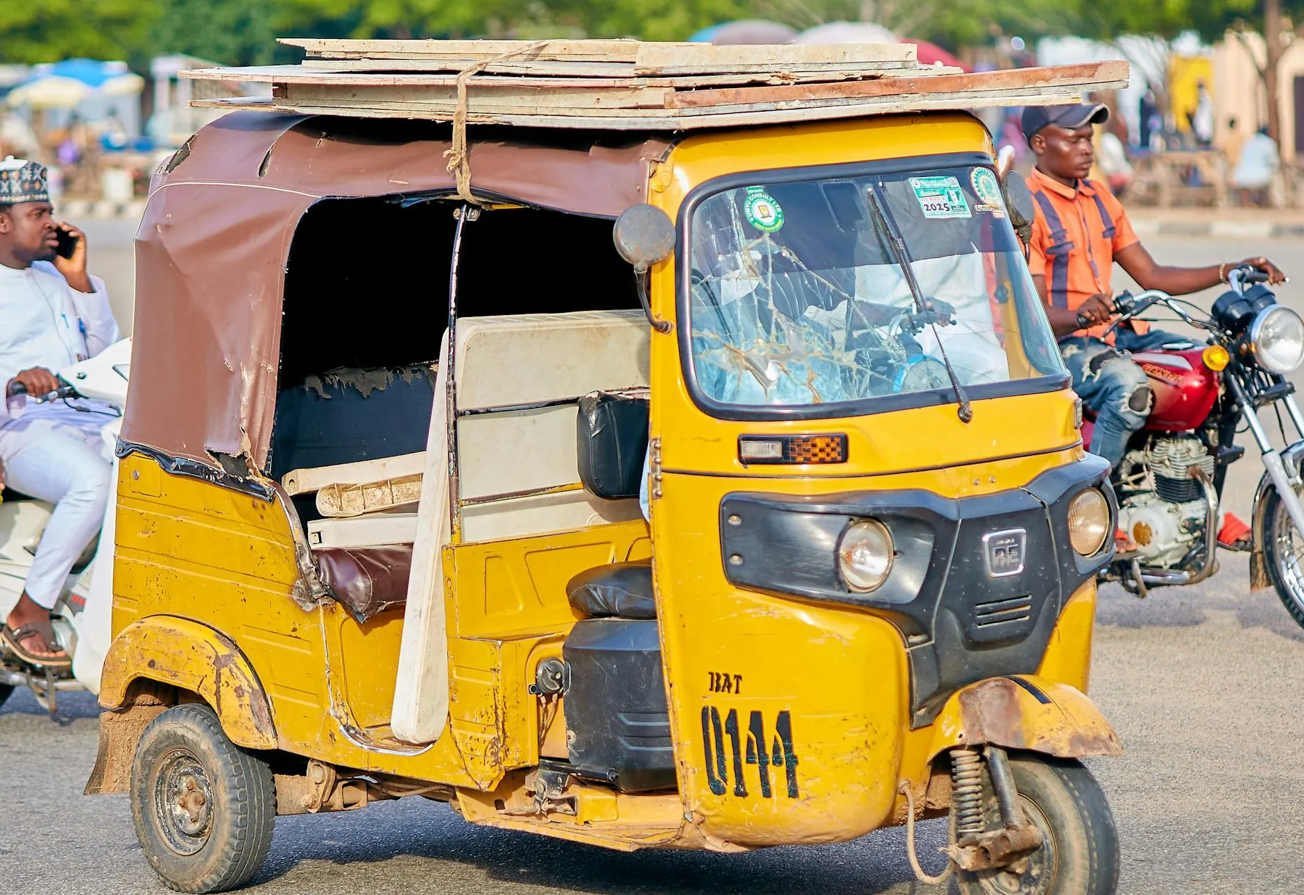 Green taxi on a Brazzaville street