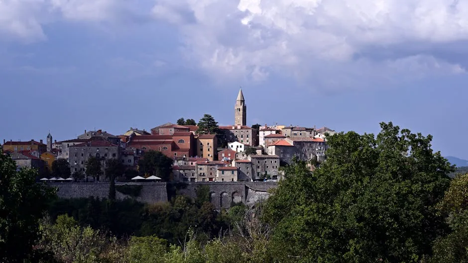 Hilltop village in Istria surrounded by rolling green countryside