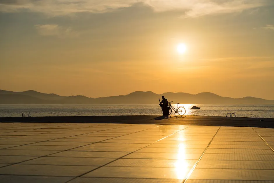 Zadar sea organ at sunset with golden light on the Adriatic