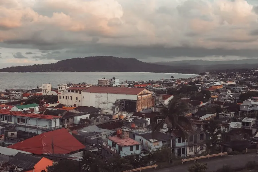 Coastal town of Baracoa surrounded by lush mountains and ocean