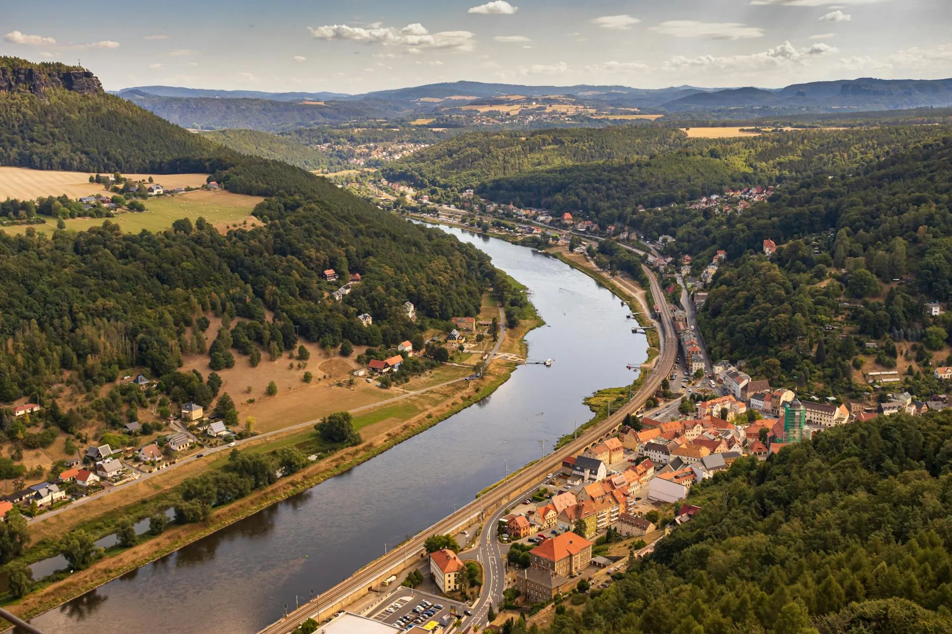 Aerial view of German countryside with rolling hills, forests and villages