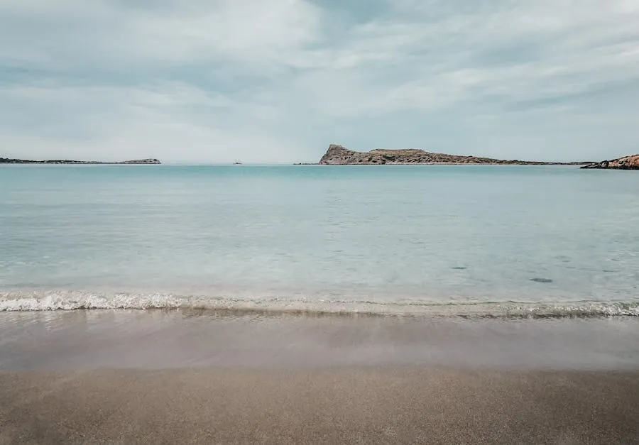 Pink-tinged sand and shallow aquamarine water at Elafonisi