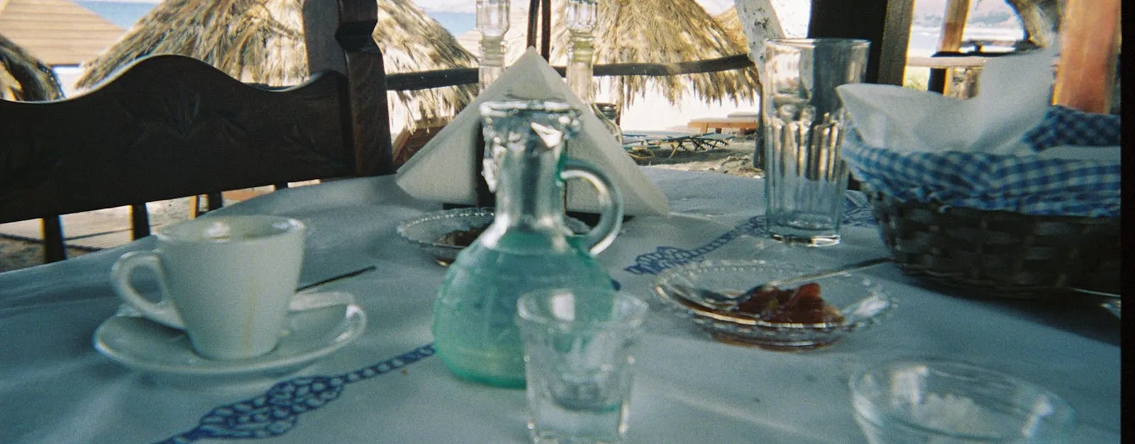 Traditional Greek meze spread on a taverna table by the sea