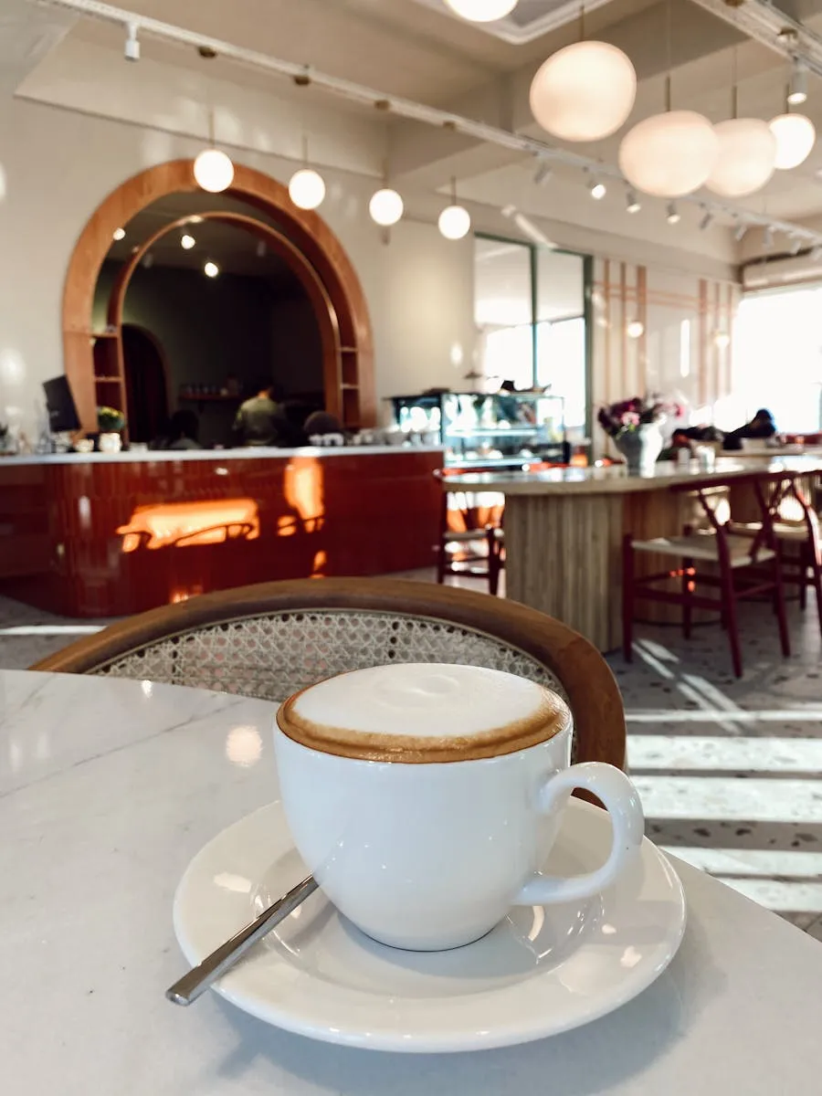 Fresh cappuccino in a cozy cafe setting