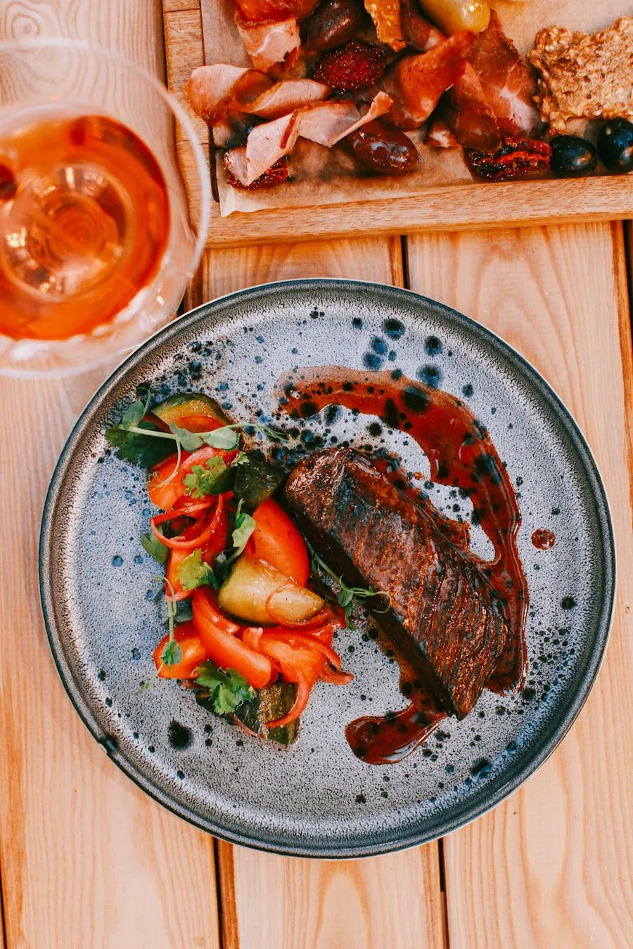 Grilled game meat steak with vegetables