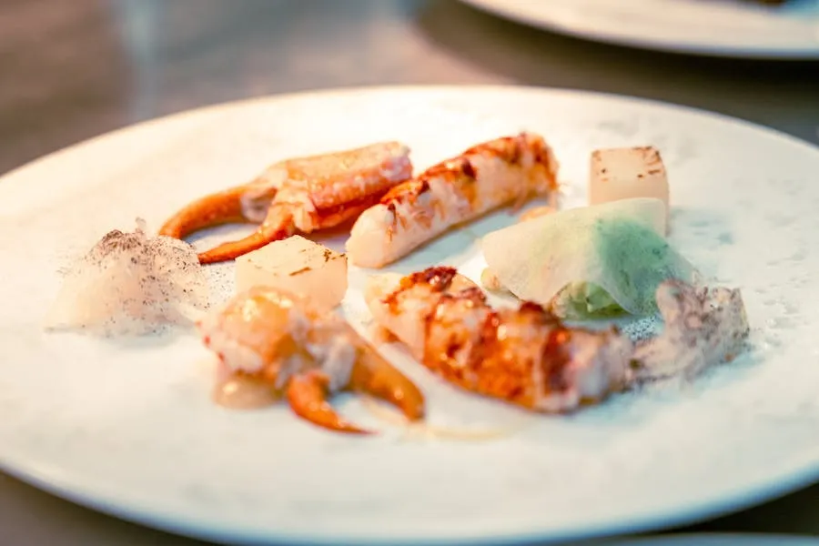 Elegant fine dining seafood plate with creative plating