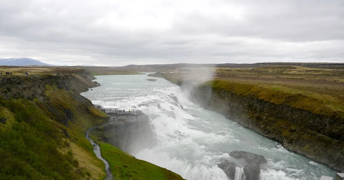 Gullfoss waterfall cascading in two tiers through a rugged canyon in Iceland
