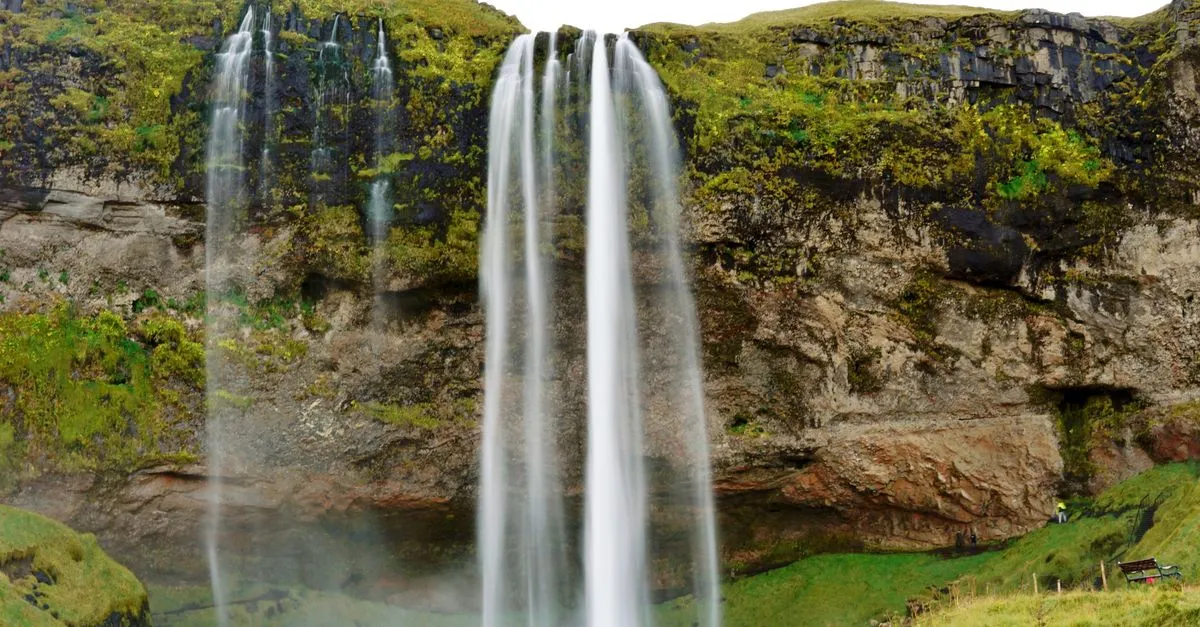 Seljalandsfoss waterfall cascading from a cliff overhang in southern Iceland