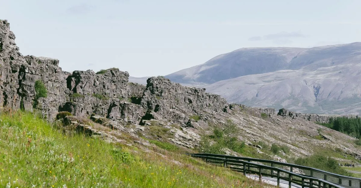 Rocky cliffs and pathway at Thingvellir National Park where tectonic plates meet