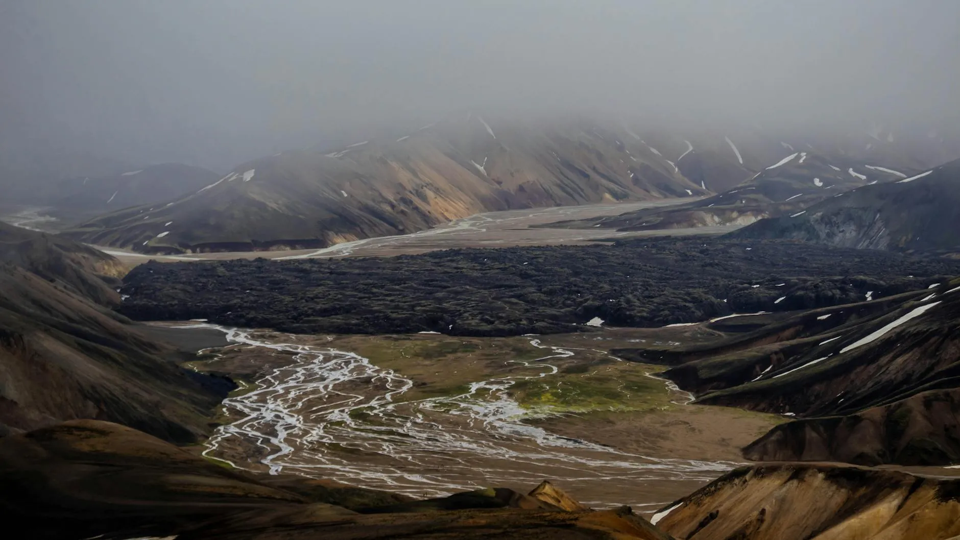 Sweeping aerial view across Iceland diverse volcanic and glacial landscape