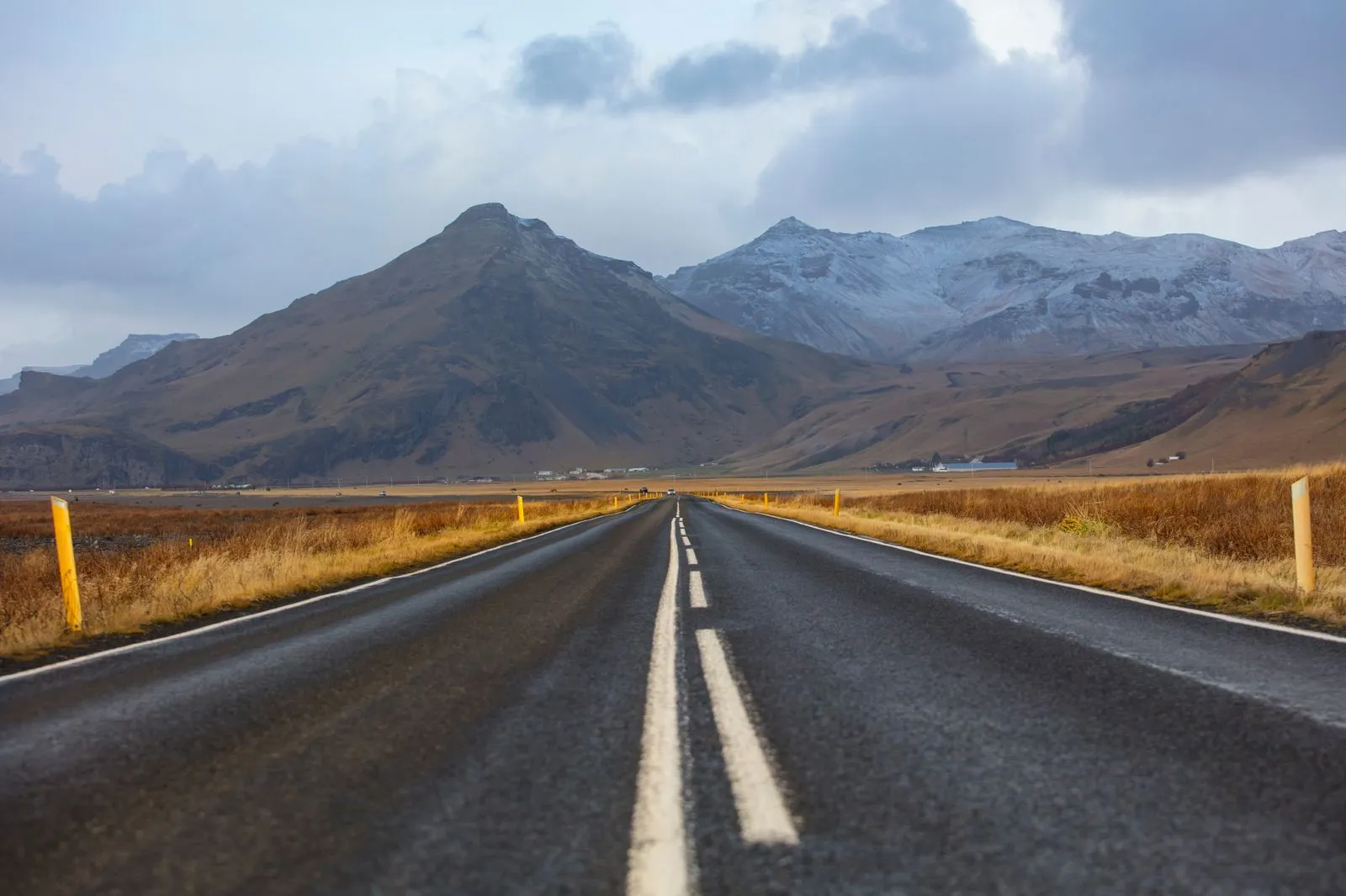 The Ring Road winding along the Icelandic coast with mountains and ocean in view