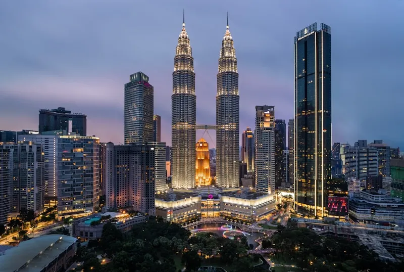 Petronas Towers and Kuala Lumpur skyline at dusk