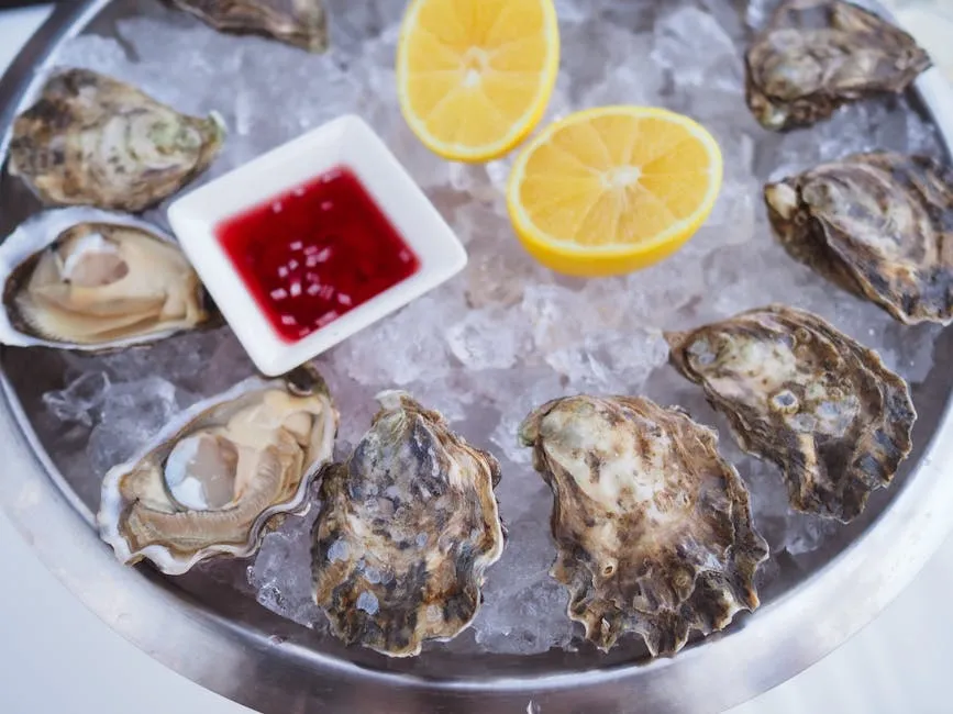 Fresh oysters on ice with lemon at a Galway seafood restaurant