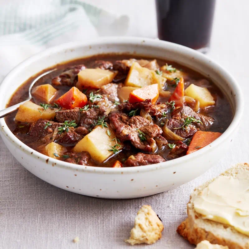 Bowl of traditional Irish stew with lamb, potatoes, and carrots