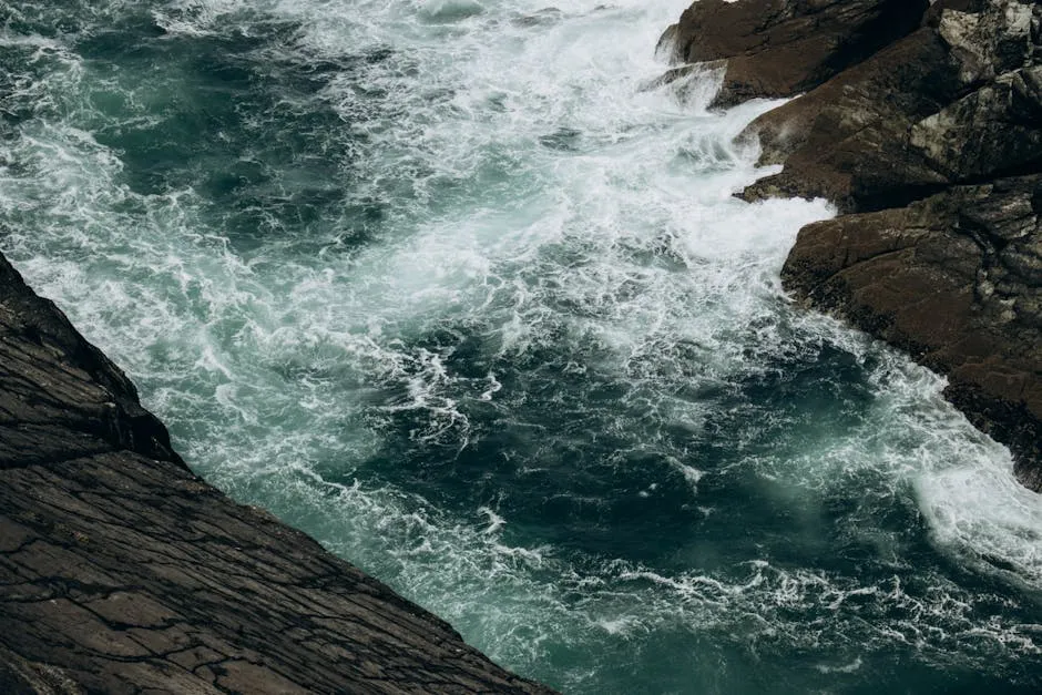 Dramatic cliffs of the Wild Atlantic Way with crashing waves