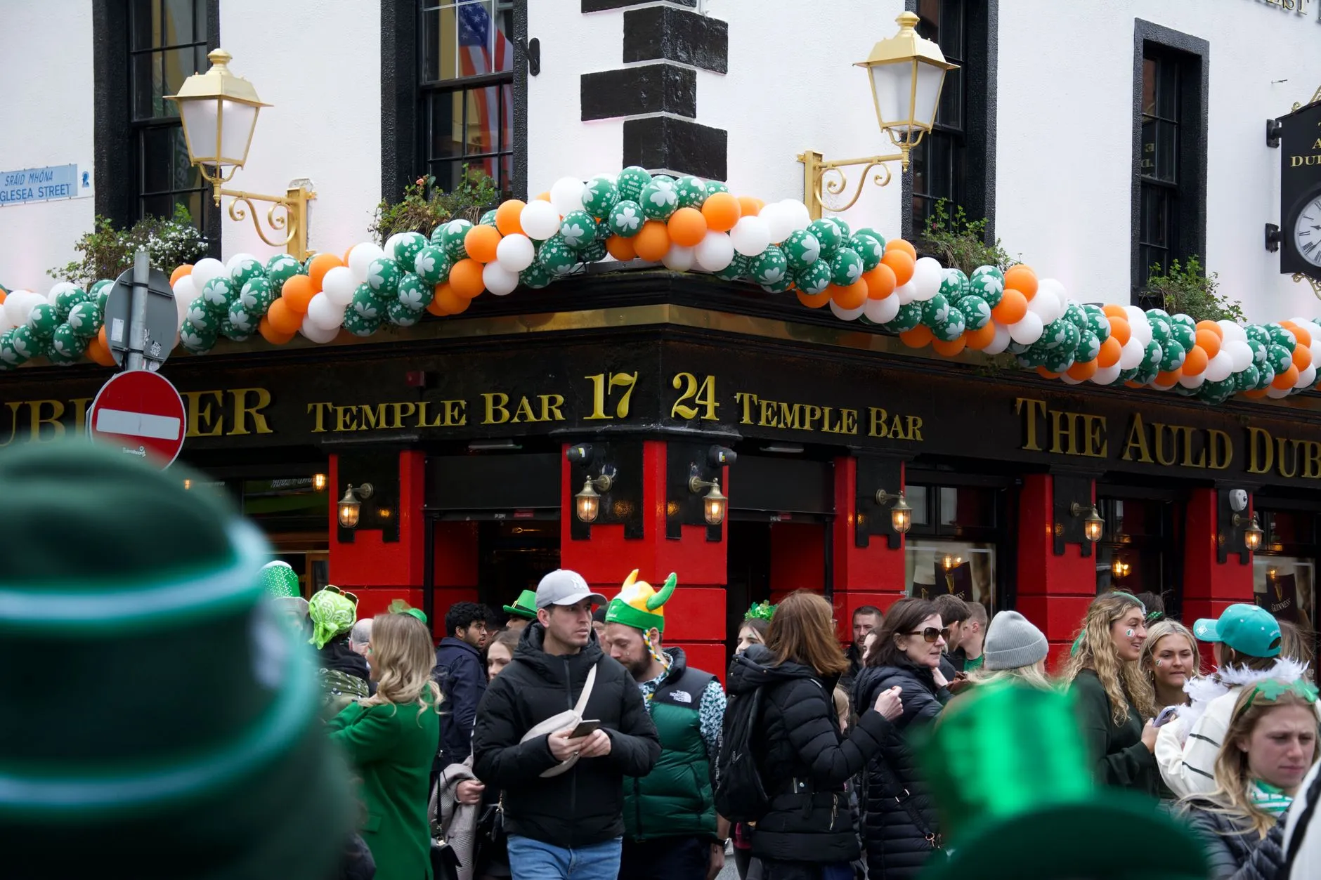 St Patrick's Day parade with crowds and green decorations in Dublin