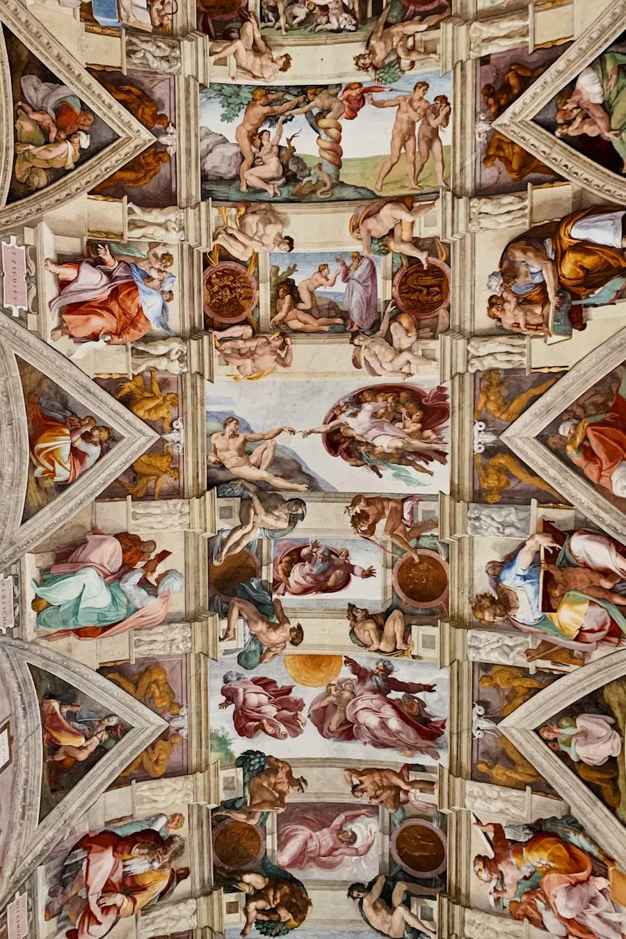 Ornate ceiling of the Sistine Chapel painted by Michelangelo