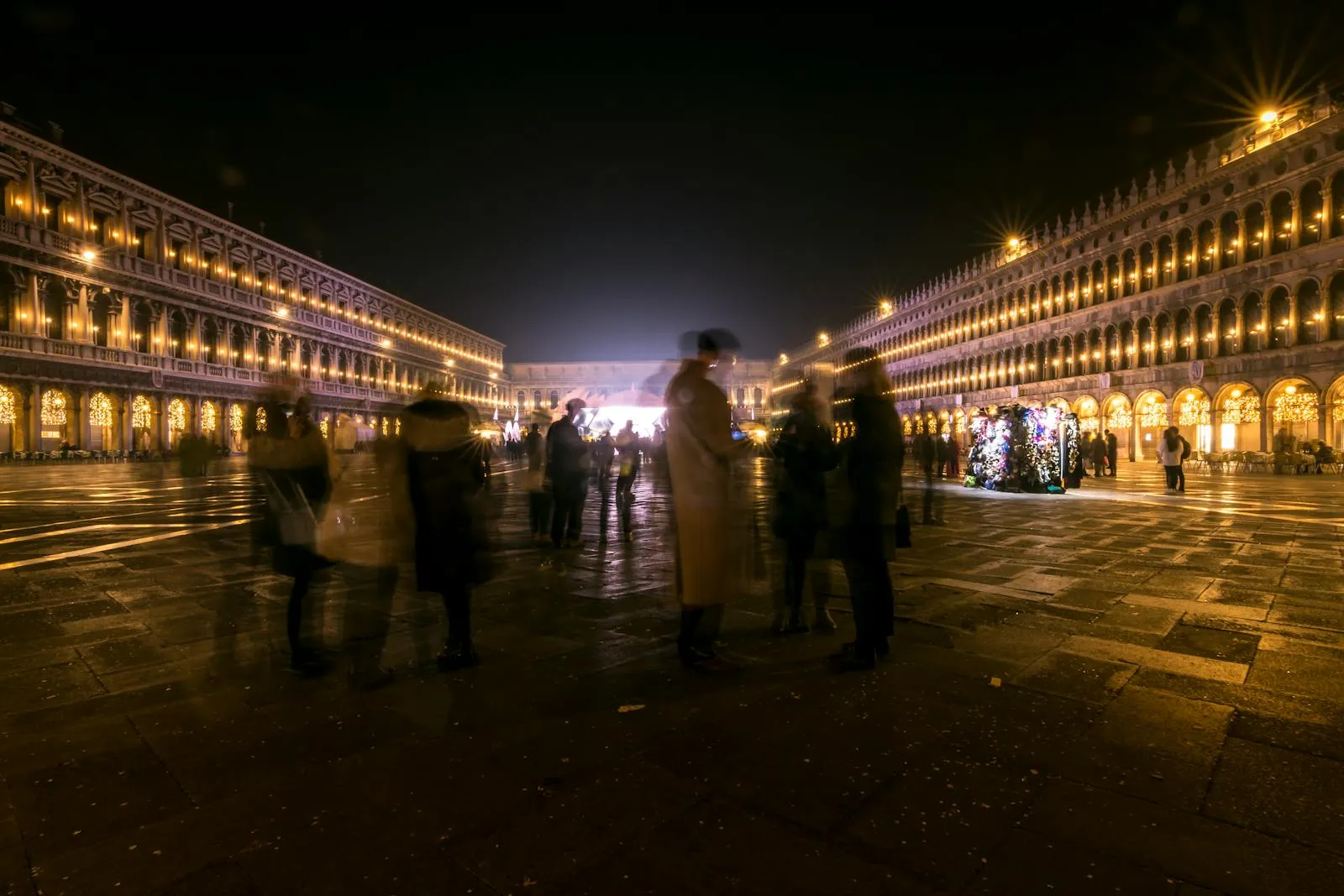 Evening passeggiata on an Italian piazza with locals enjoying aperitivo