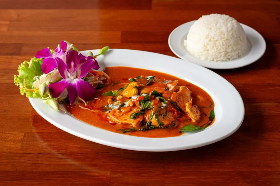 Akoho sy voanio chicken in coconut milk sauce