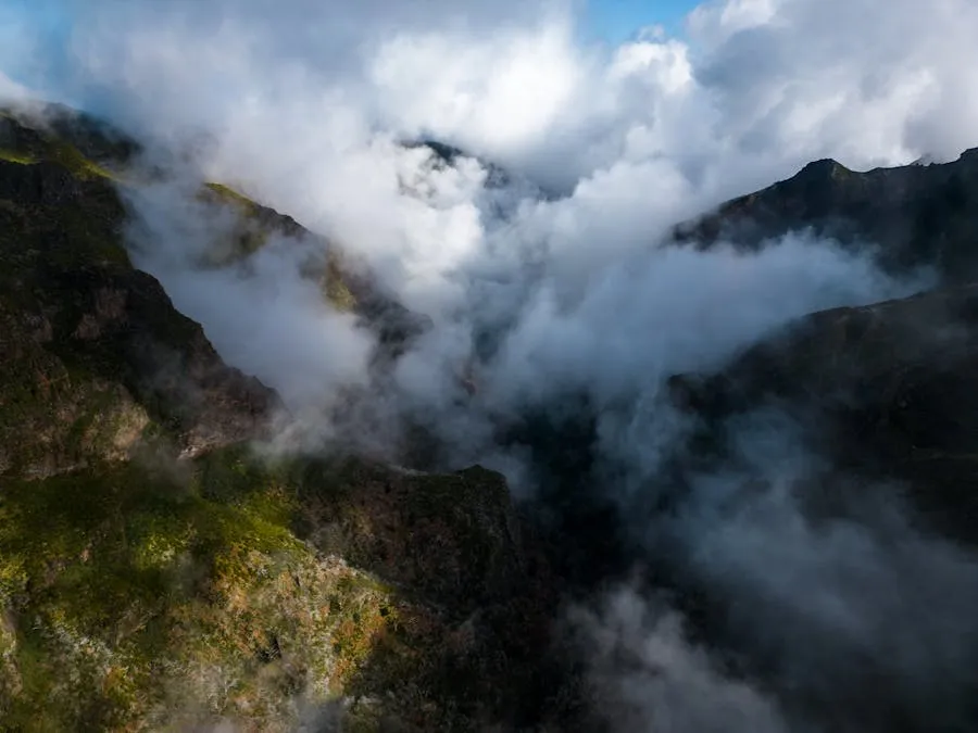 Deep valley of Curral das Freiras surrounded by towering mountain walls