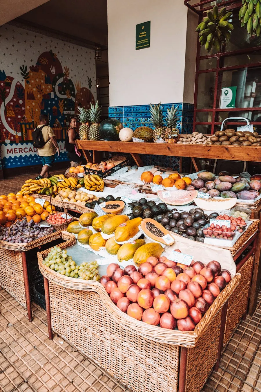 Vibrant tropical fruit display at Mercado dos Lavradores in Funchal