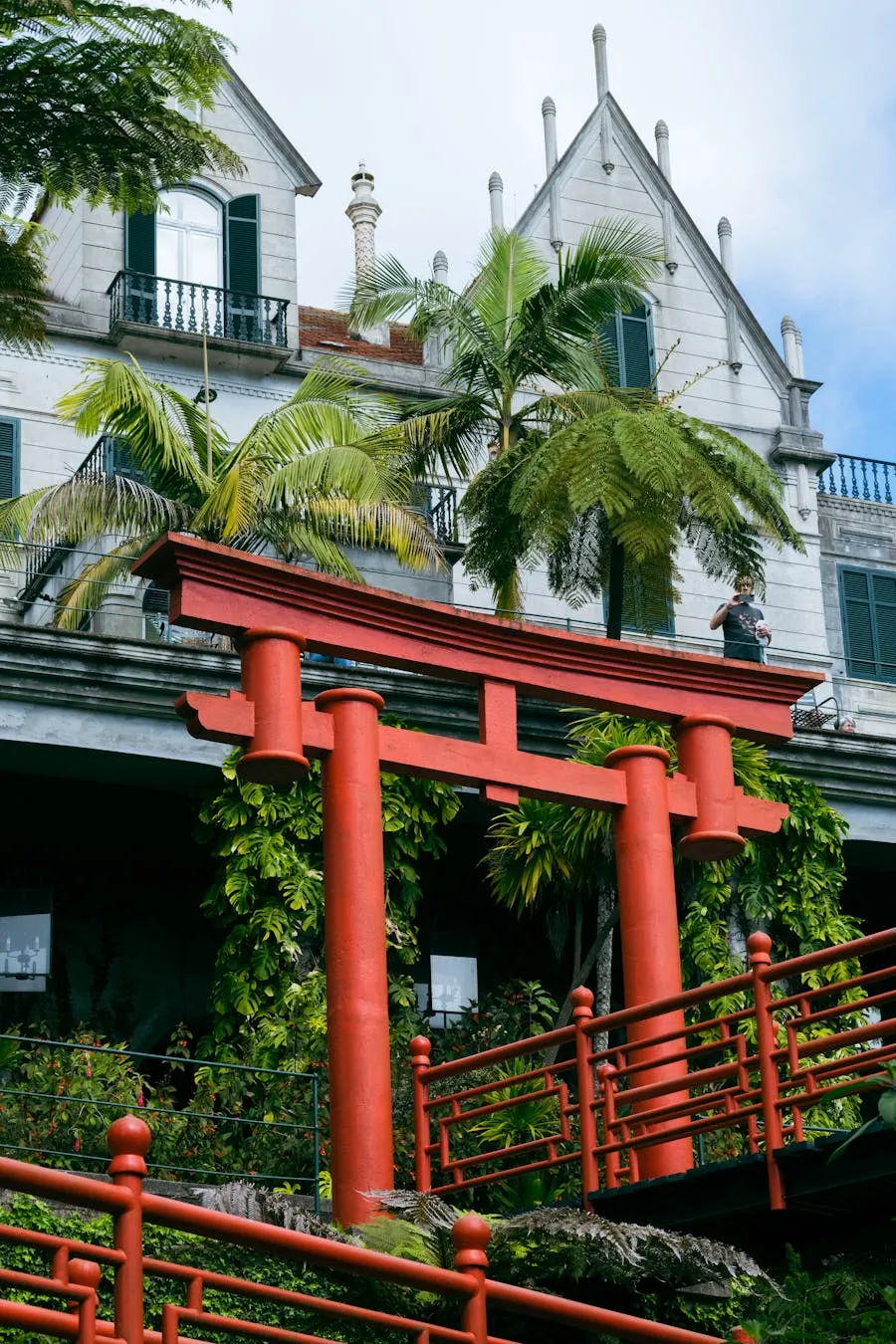 Ornate gate and tropical gardens at Monte Palace in Madeira