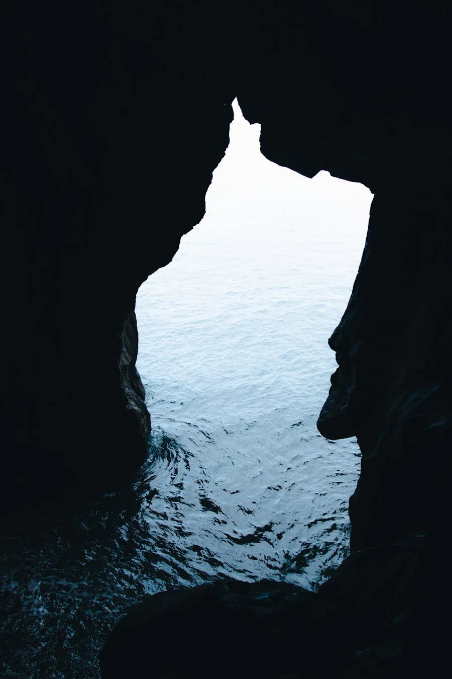 Ocean view through a volcanic cave opening on Madeira&rsquo;s north coast
