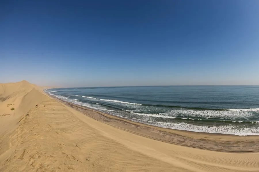 Dunes meeting the ocean at Sandwich Harbour
