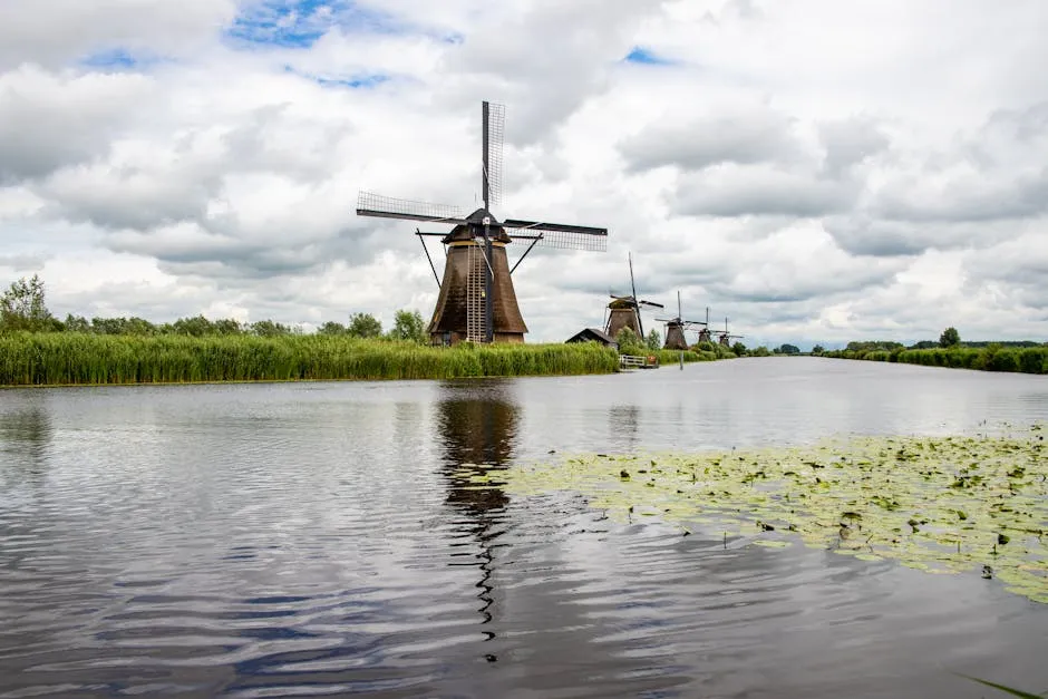 Kinderdijk windmills reflected in canal water