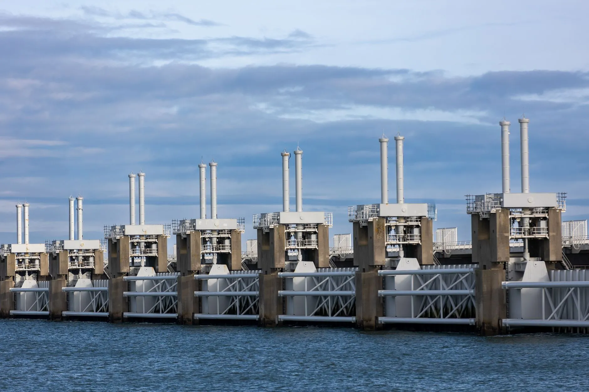 Delta Works storm surge barrier in Zeeland with dramatic sky