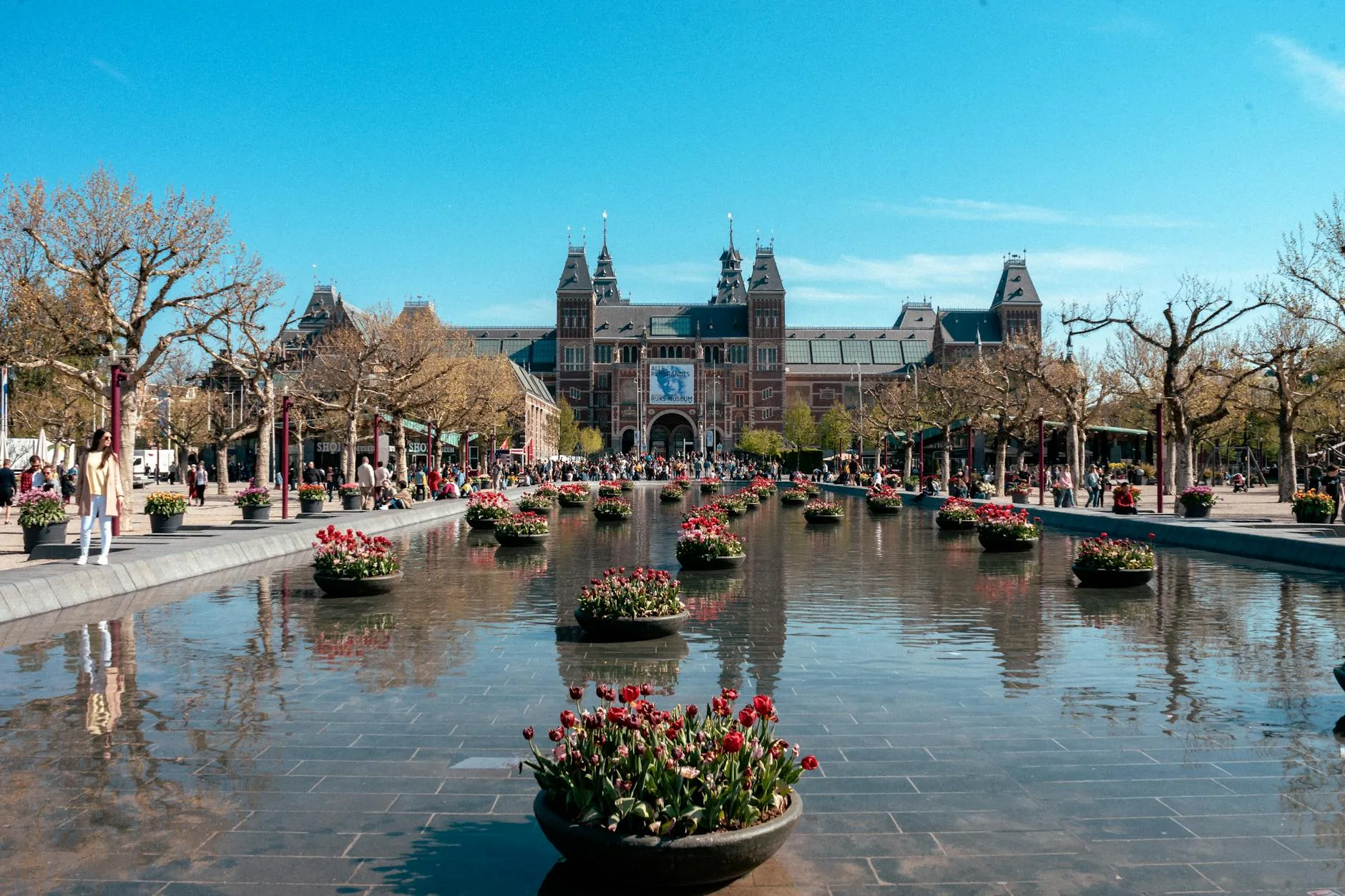 Rijksmuseum facade with I Amsterdam letters and reflecting pool