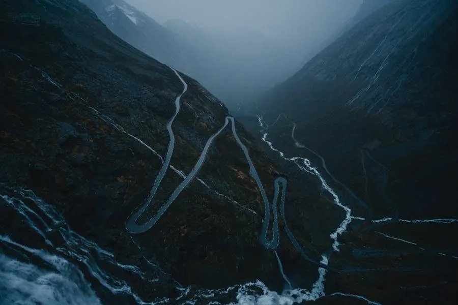 Trollstigen mountain road switchbacks clinging to a steep mountainside
