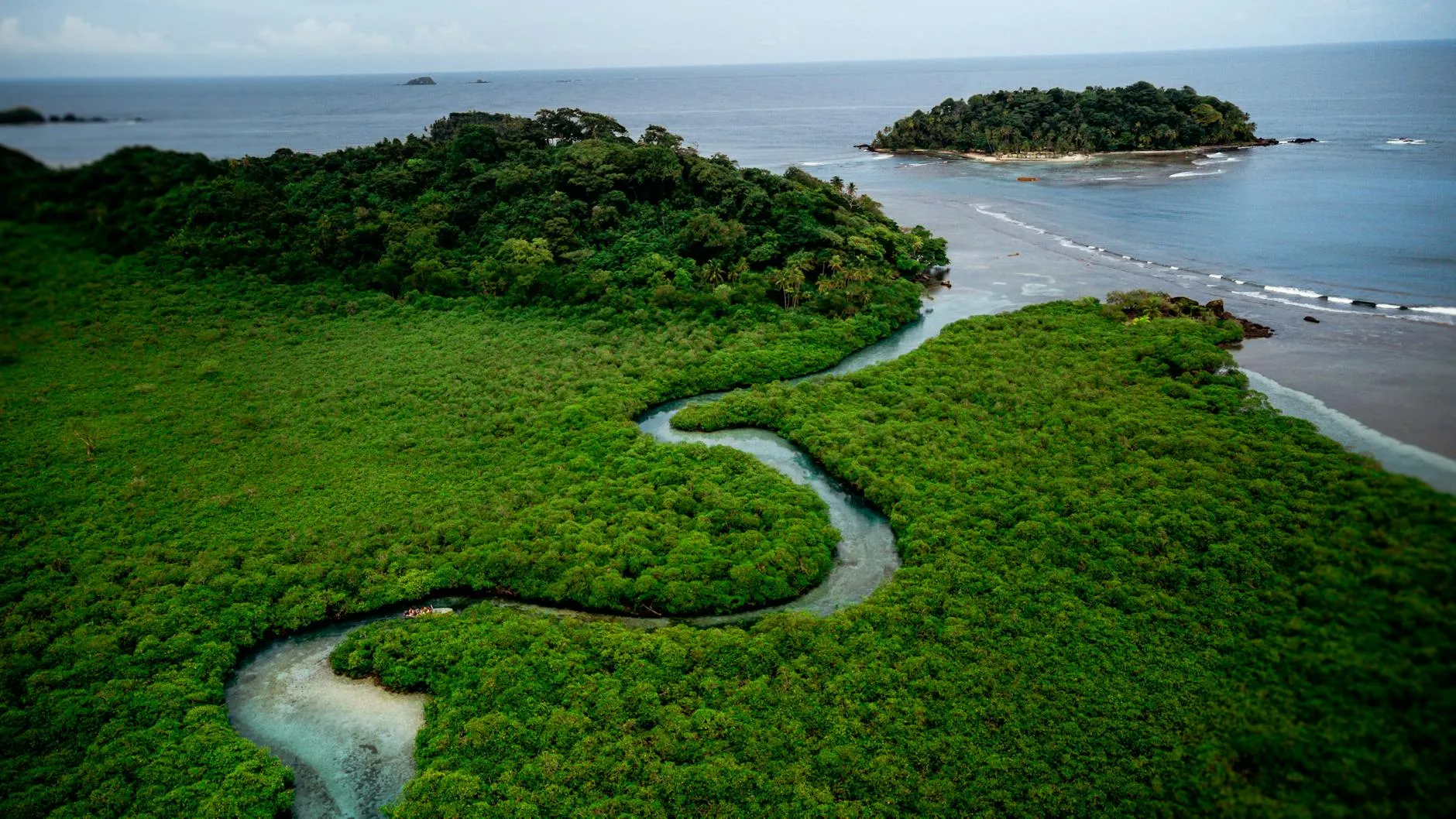 Aerial panorama of the Panamanian landscape with canal and jungle