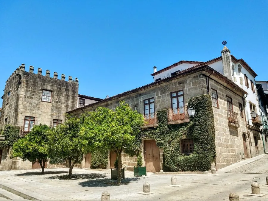 Medieval castle walls and towers in the historic centre of Guimaraes