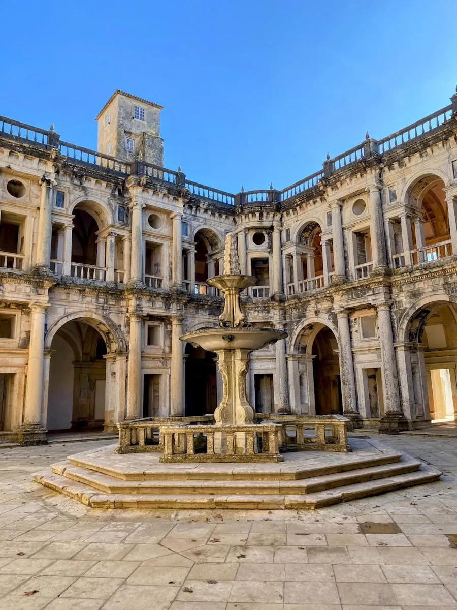 Medieval courtyard and fountain at the Convent of Christ in Tomar