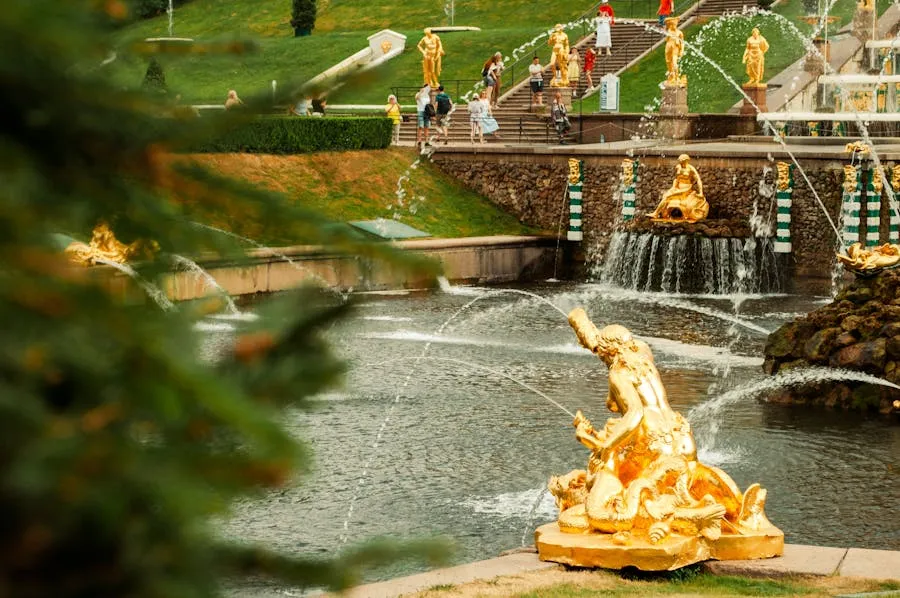 Peterhof Grand Cascade with golden statues and fountains flowing towards the sea