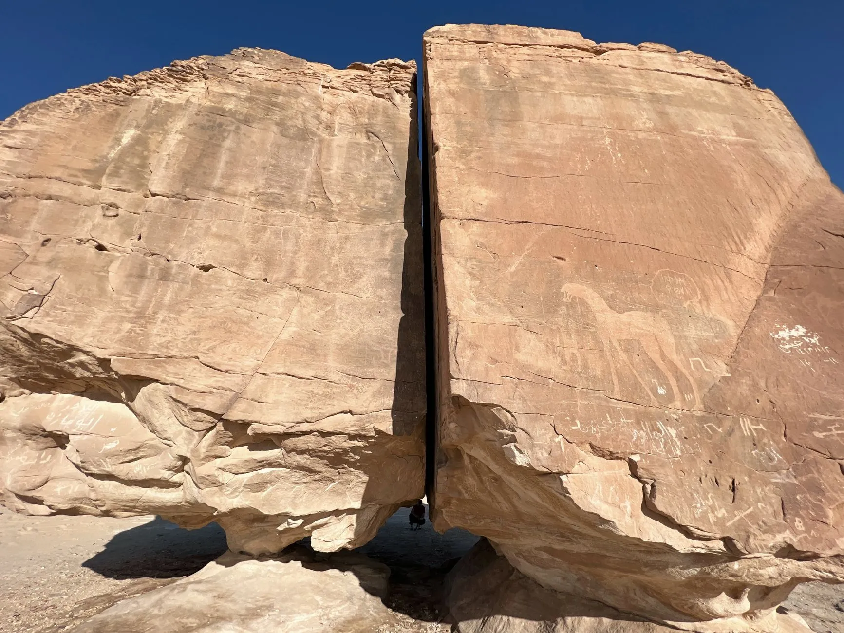 Qasr al-Farid tomb at Hegra, a massive carved facade standing alone in the desert