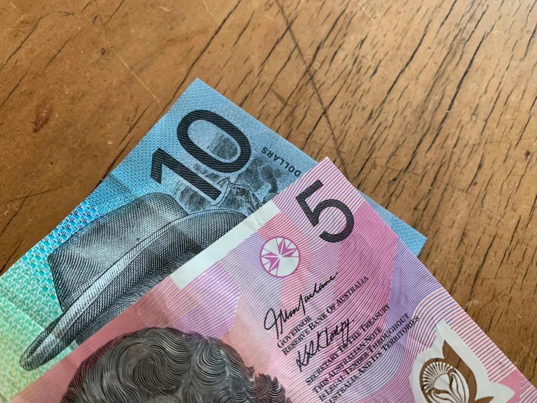 Singapore dollar notes and coins, money planning concept.