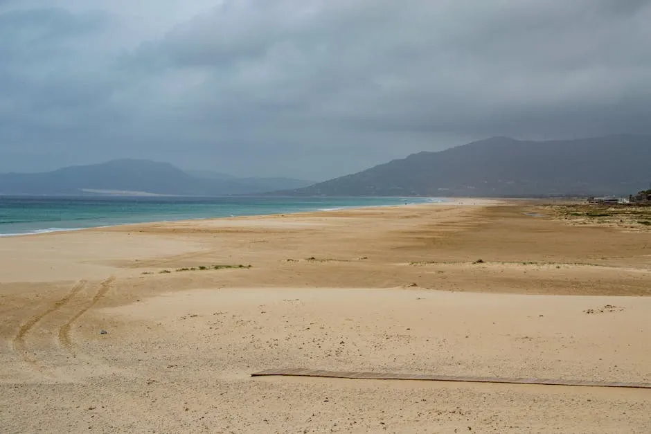 Wide sandy beach of Playa de Bolonia with its great dune